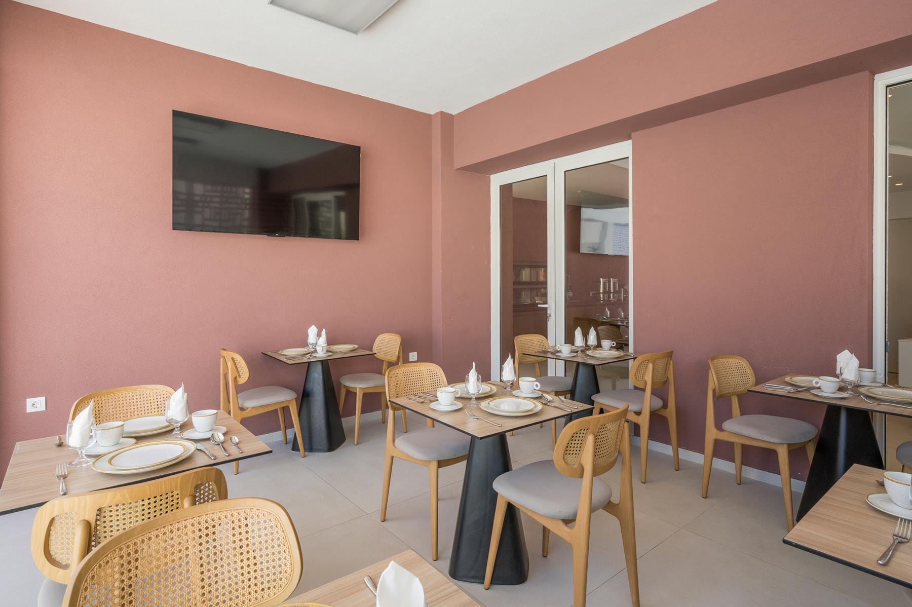 a room with tables and chairs