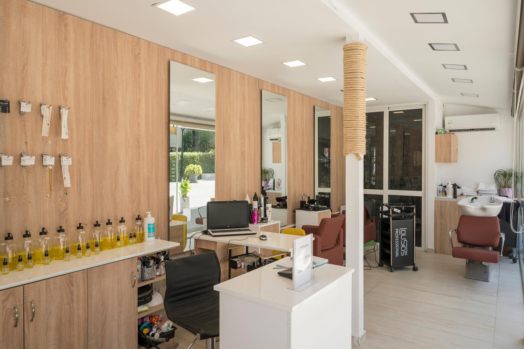 a room with a bar and chairs