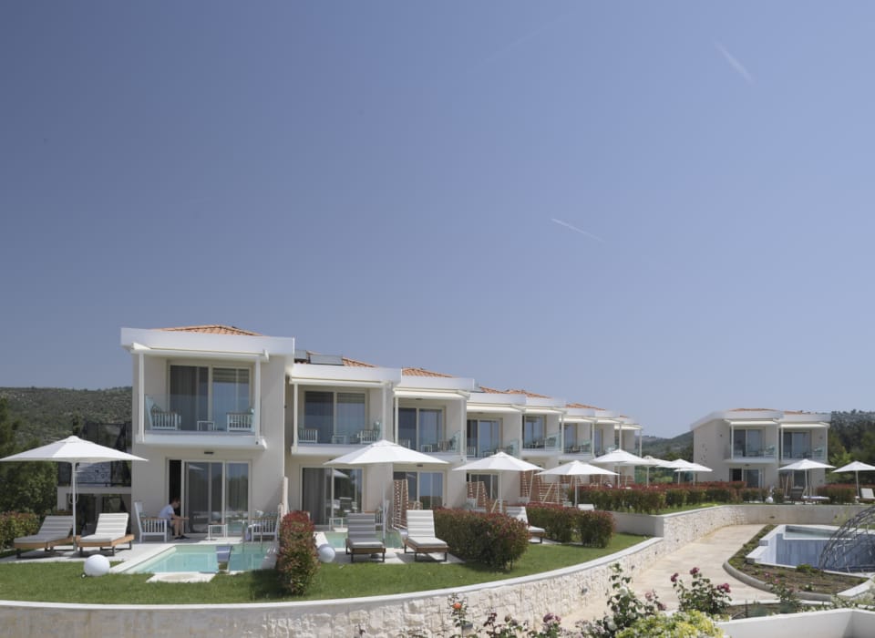 a large house with a pool