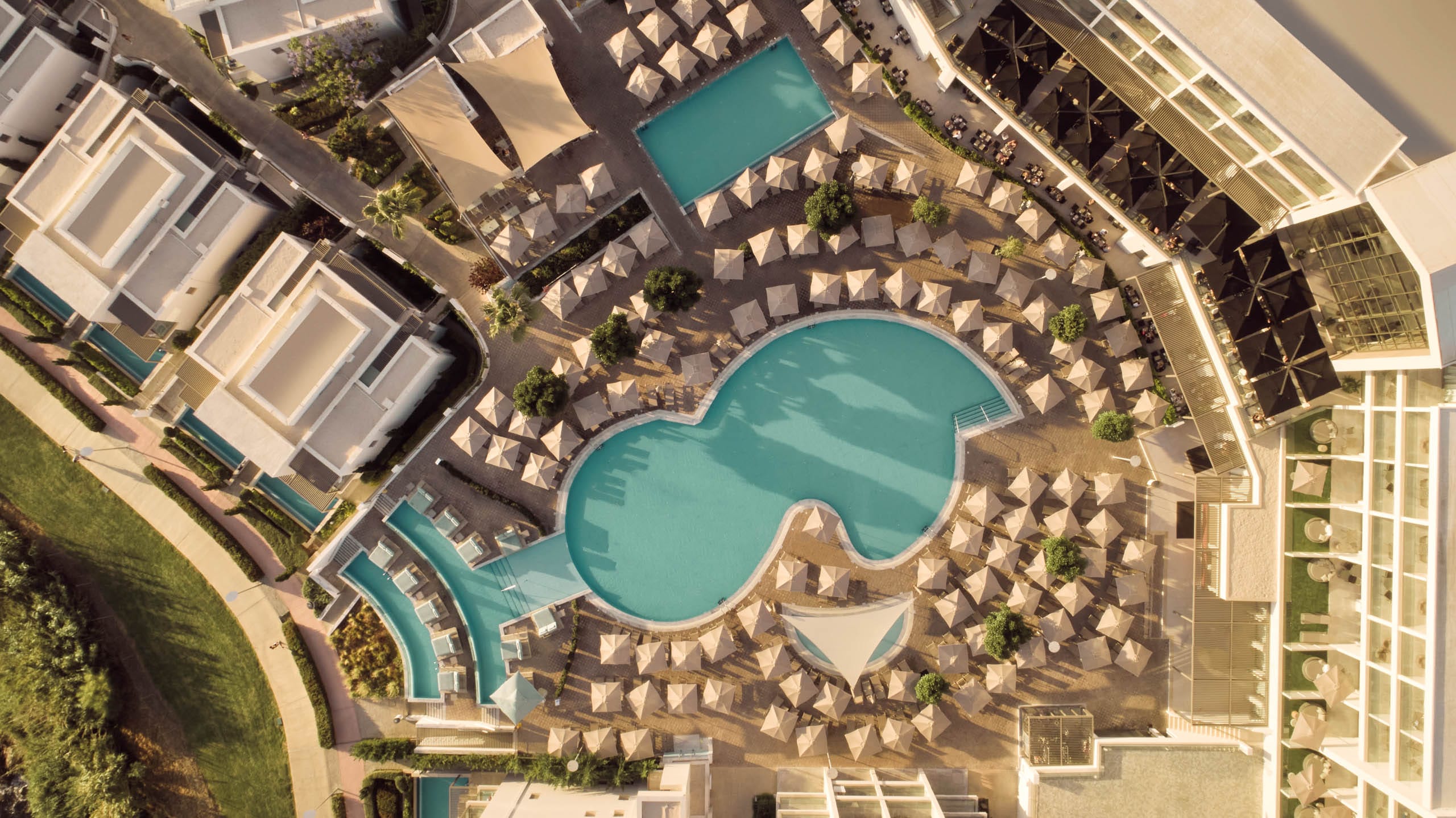 a large courtyard with a pool