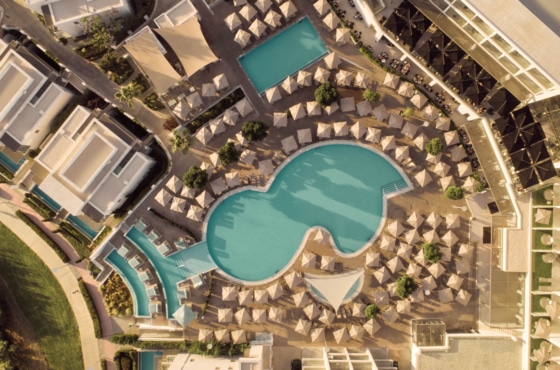 a large courtyard with a pool