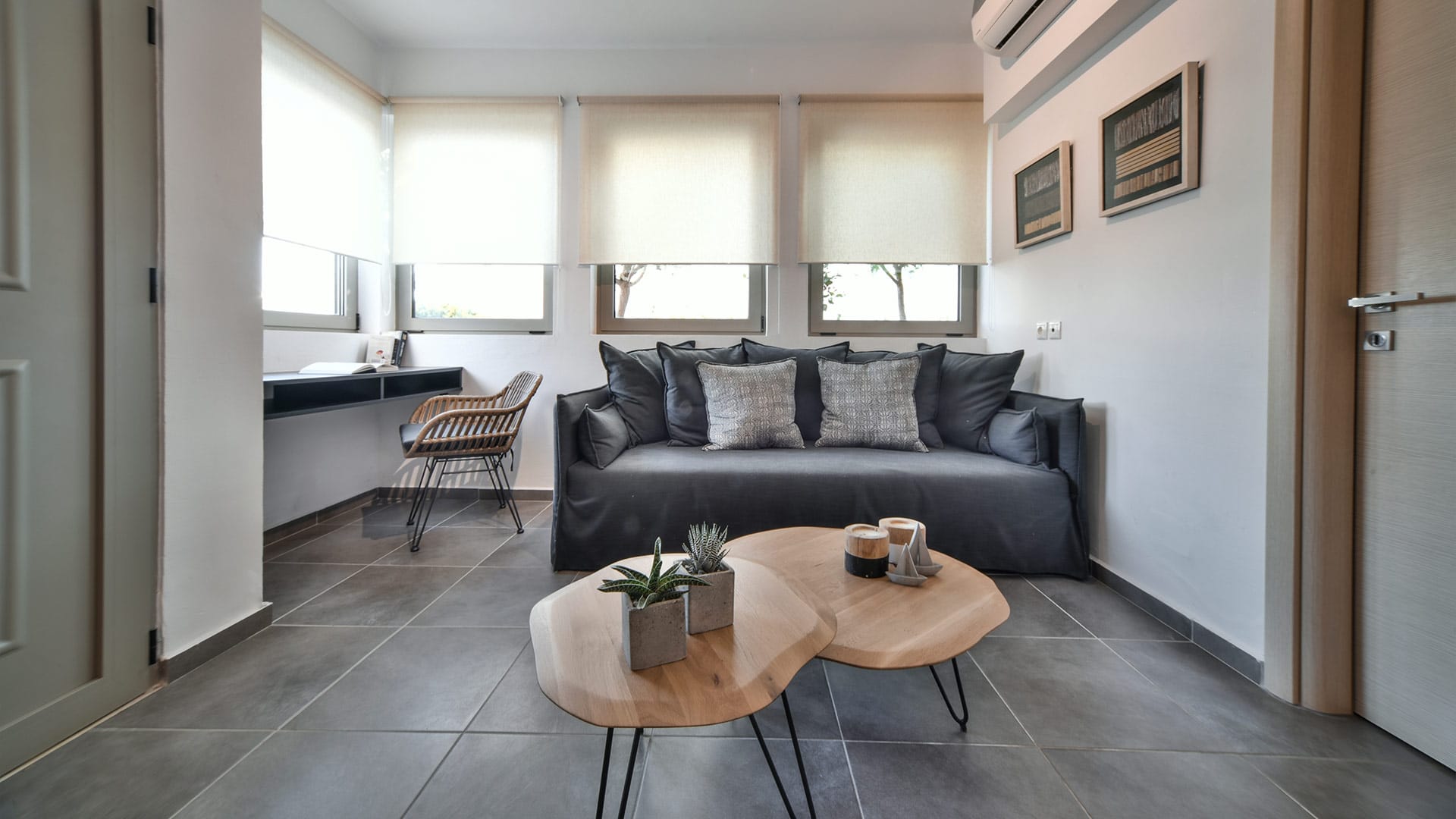 a living room with a couch and coffee table