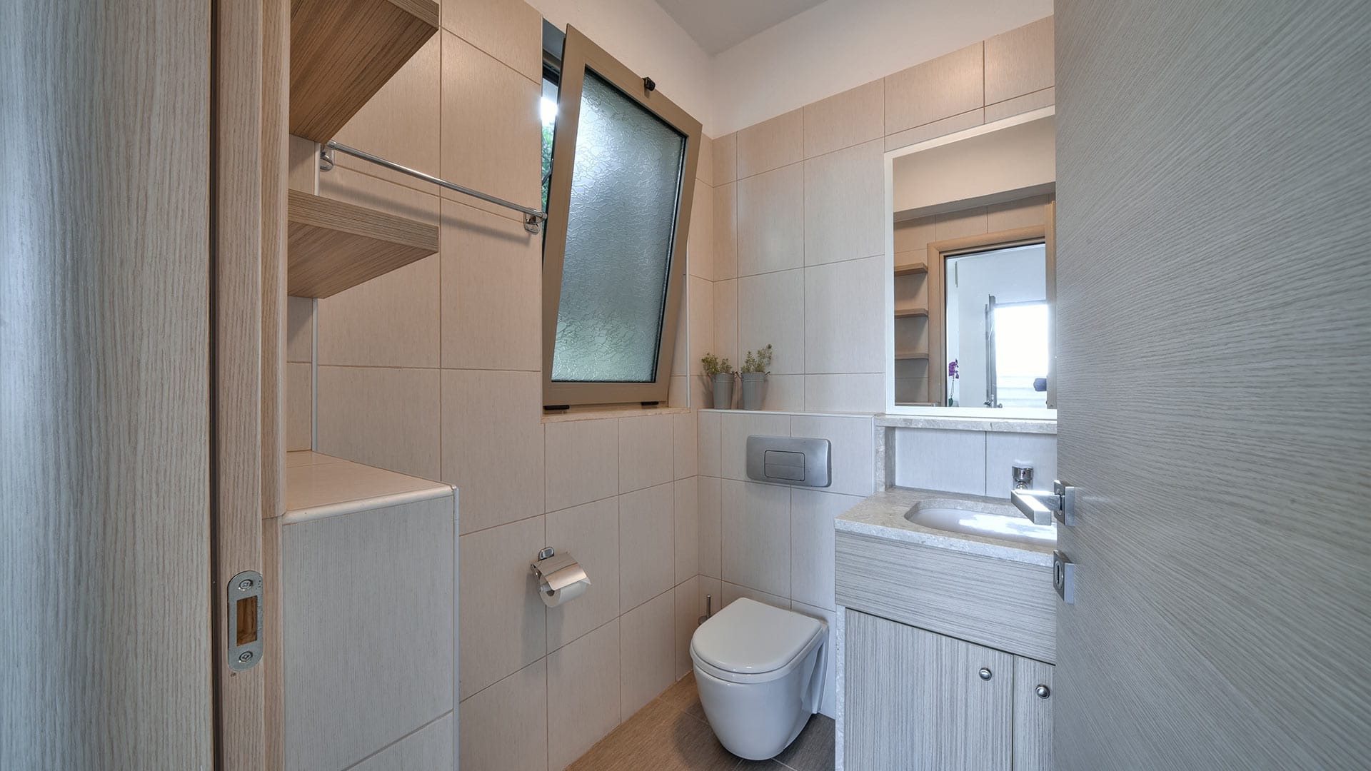 a bathroom with a tub and sink