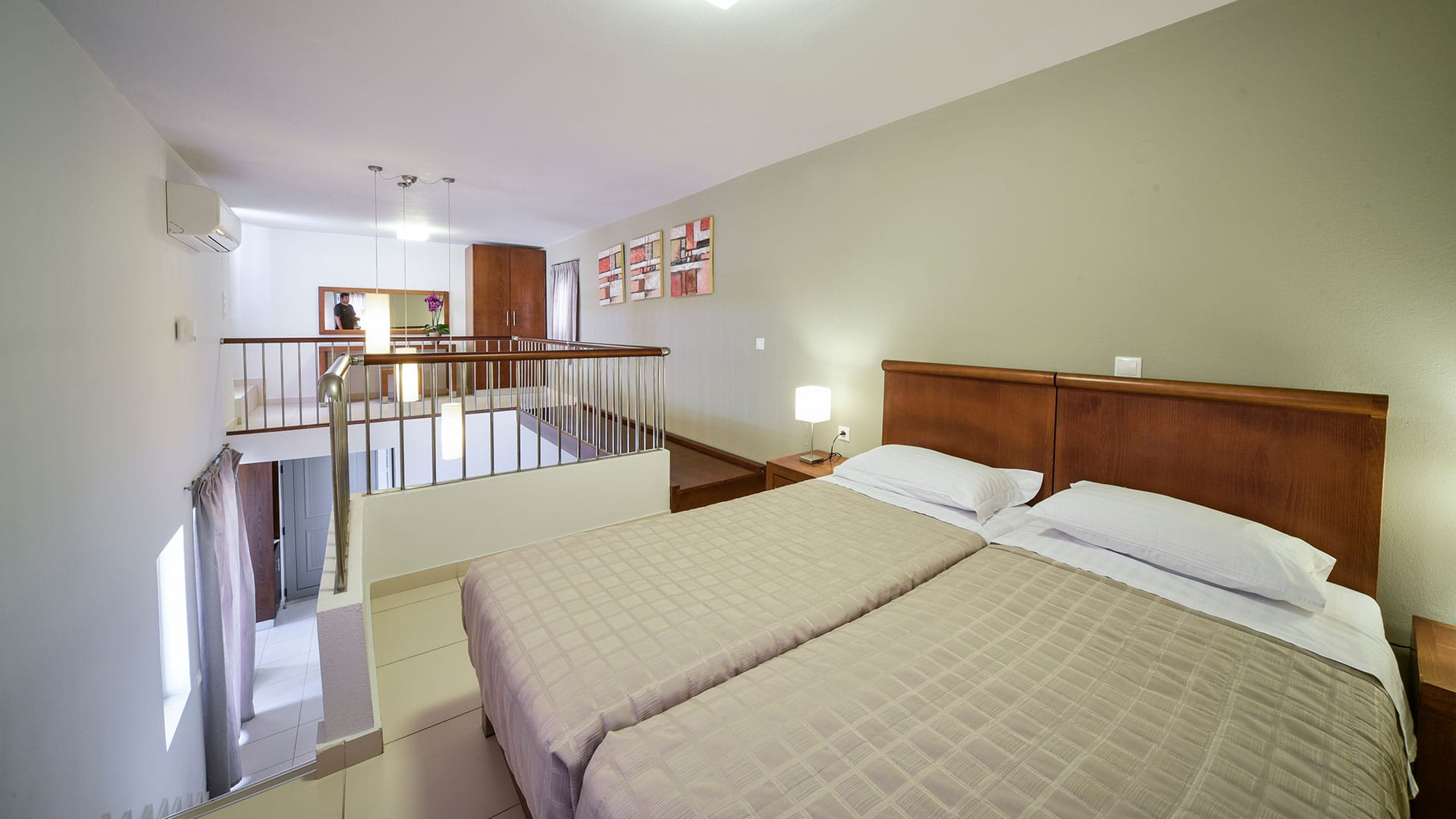 a hotel room with two beds