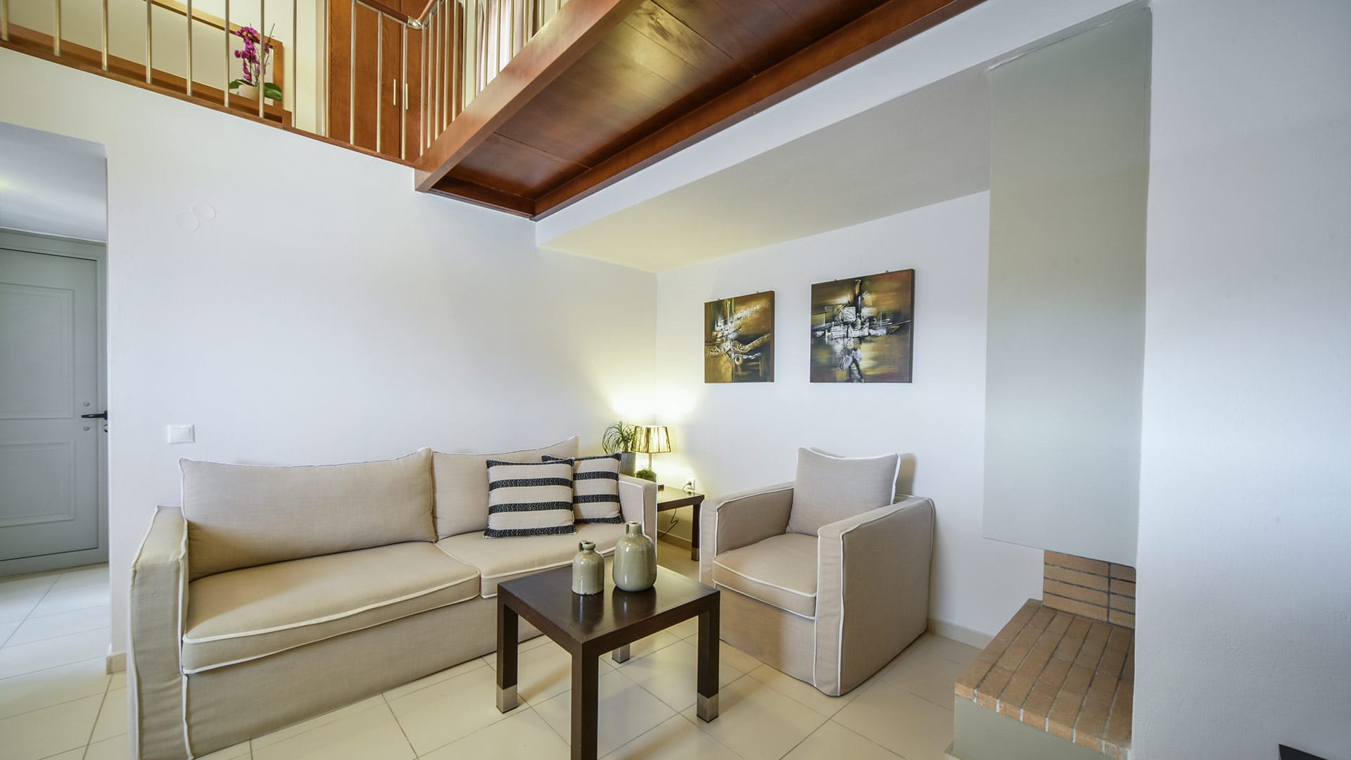 a living room with a couch and a table