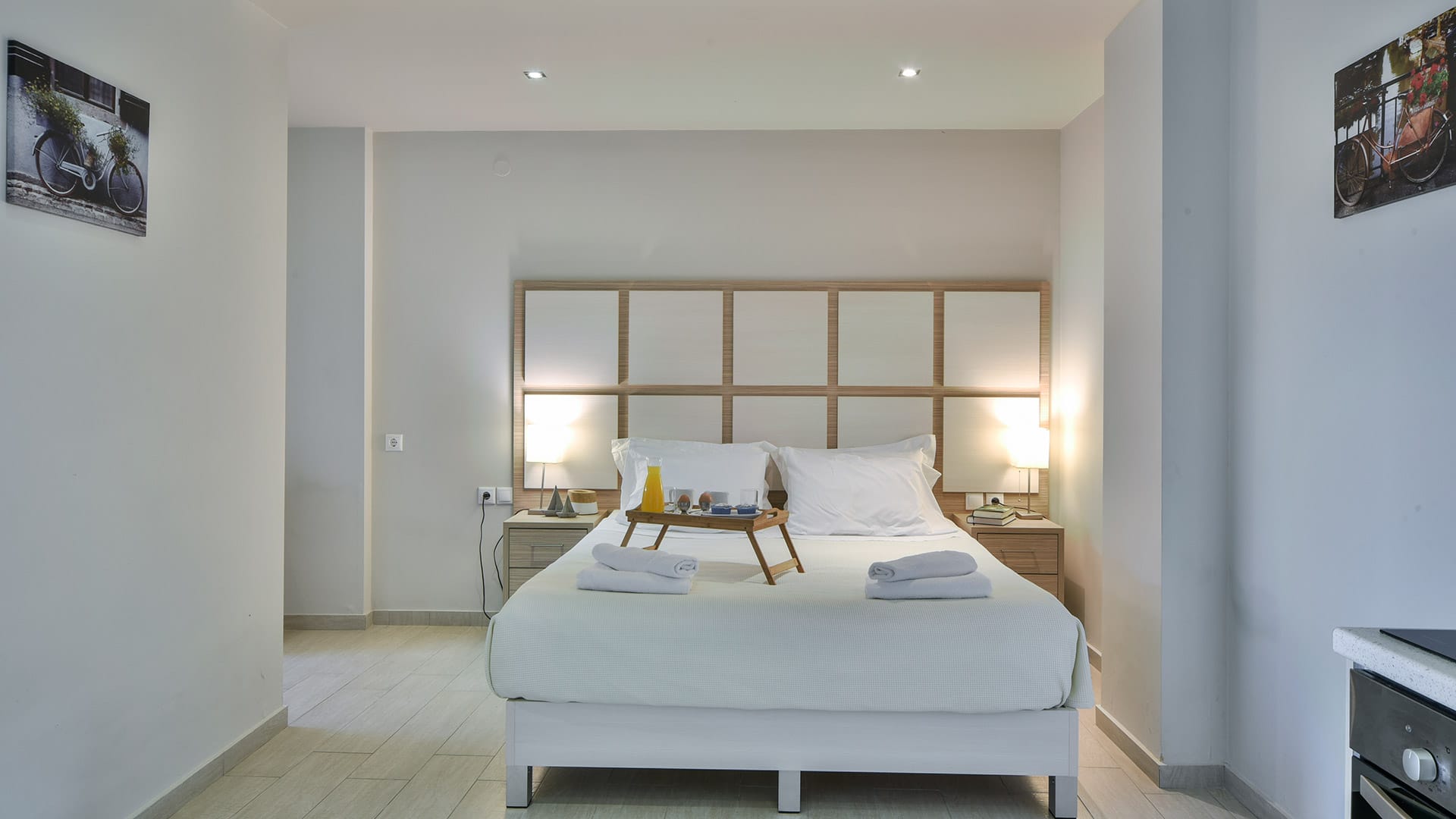 a bedroom with a bed and a table