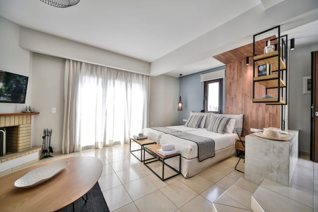 a bedroom with a fireplace