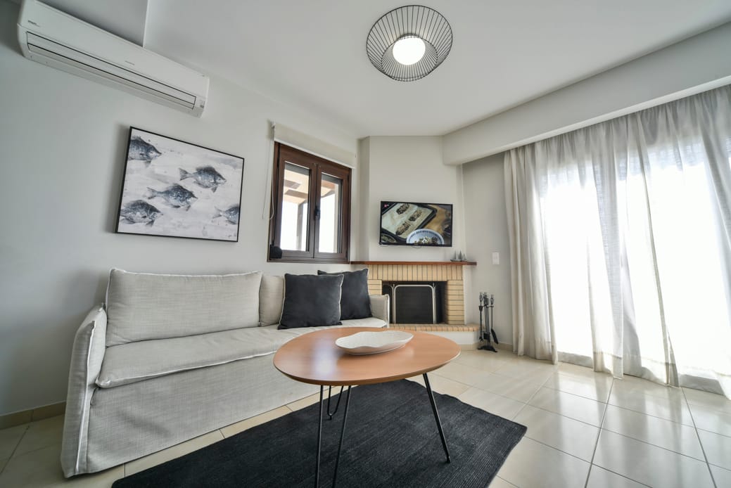 a living room with a couch and a table