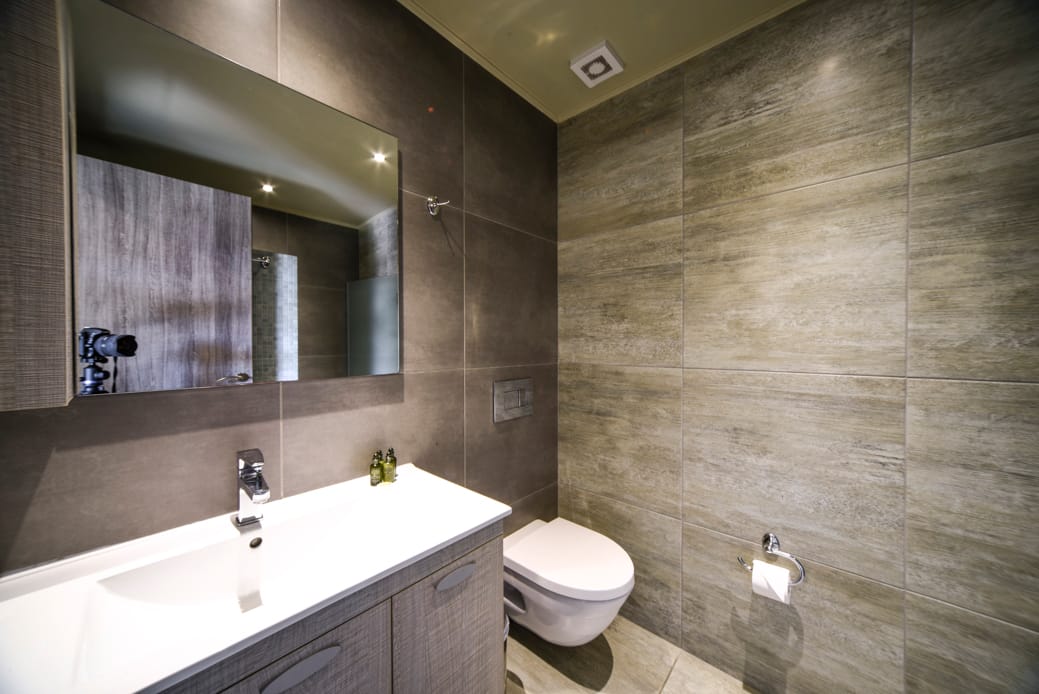 a bathroom with a glass shower