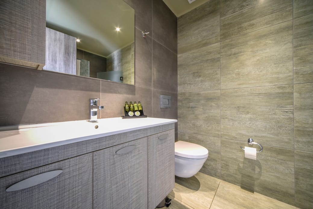 a bathroom with a large mirror