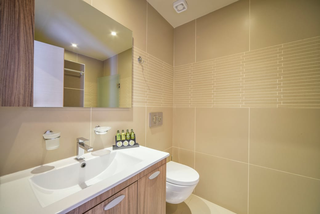 a bathroom with a sink and toilet