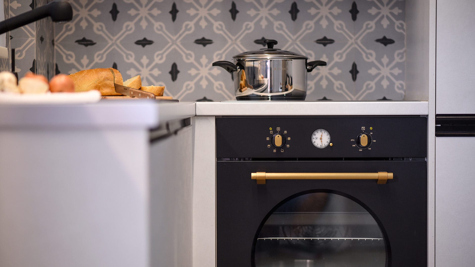 a stove with a pot on top