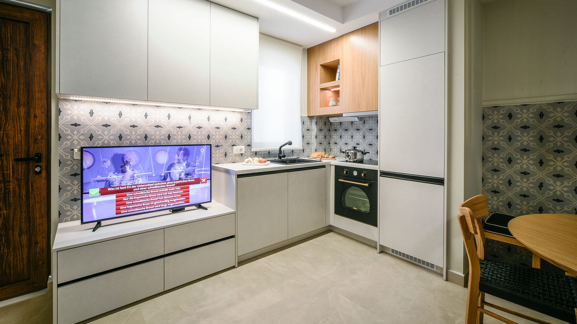 a kitchen with white cabinets