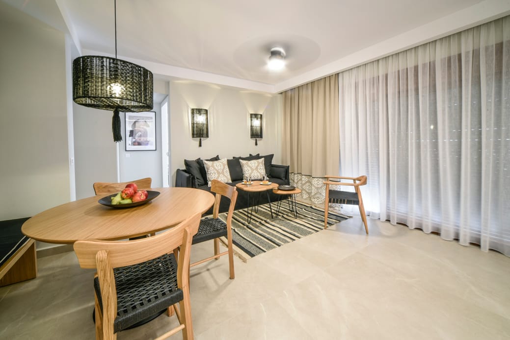 a room with a table and chairs