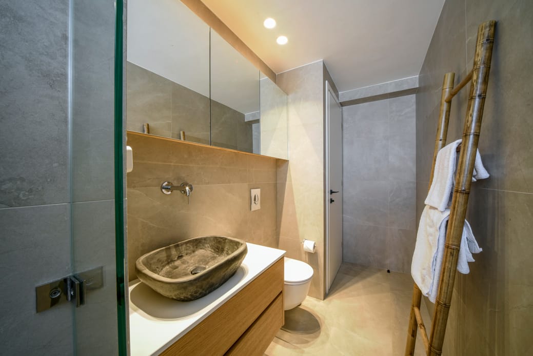 a bathroom with a sink and a toilet