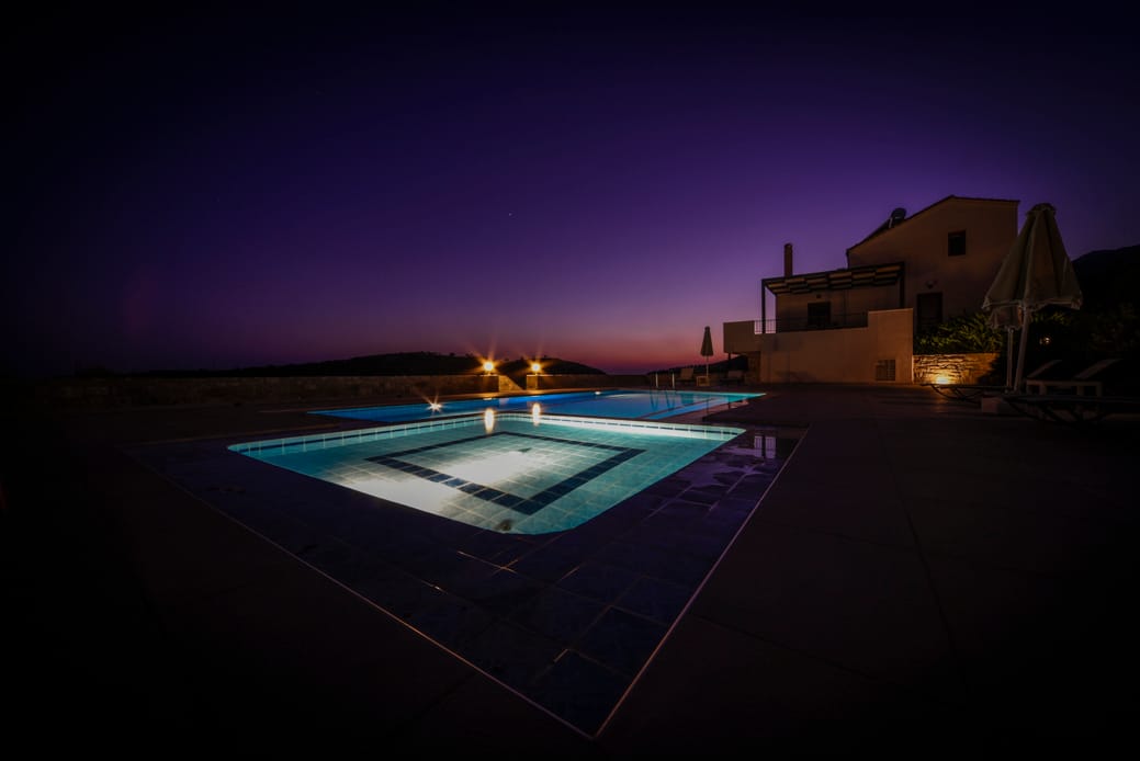 a swimming pool at night