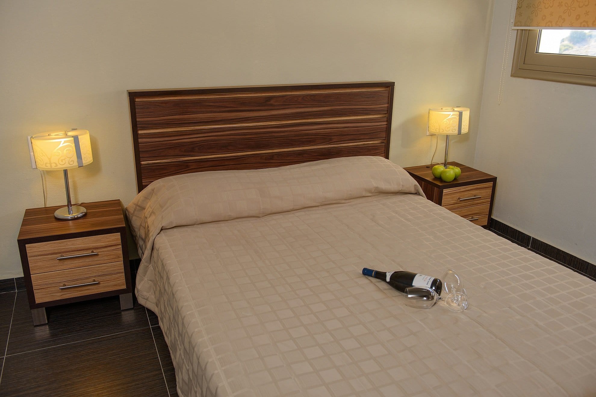 a bed with a remote control on it