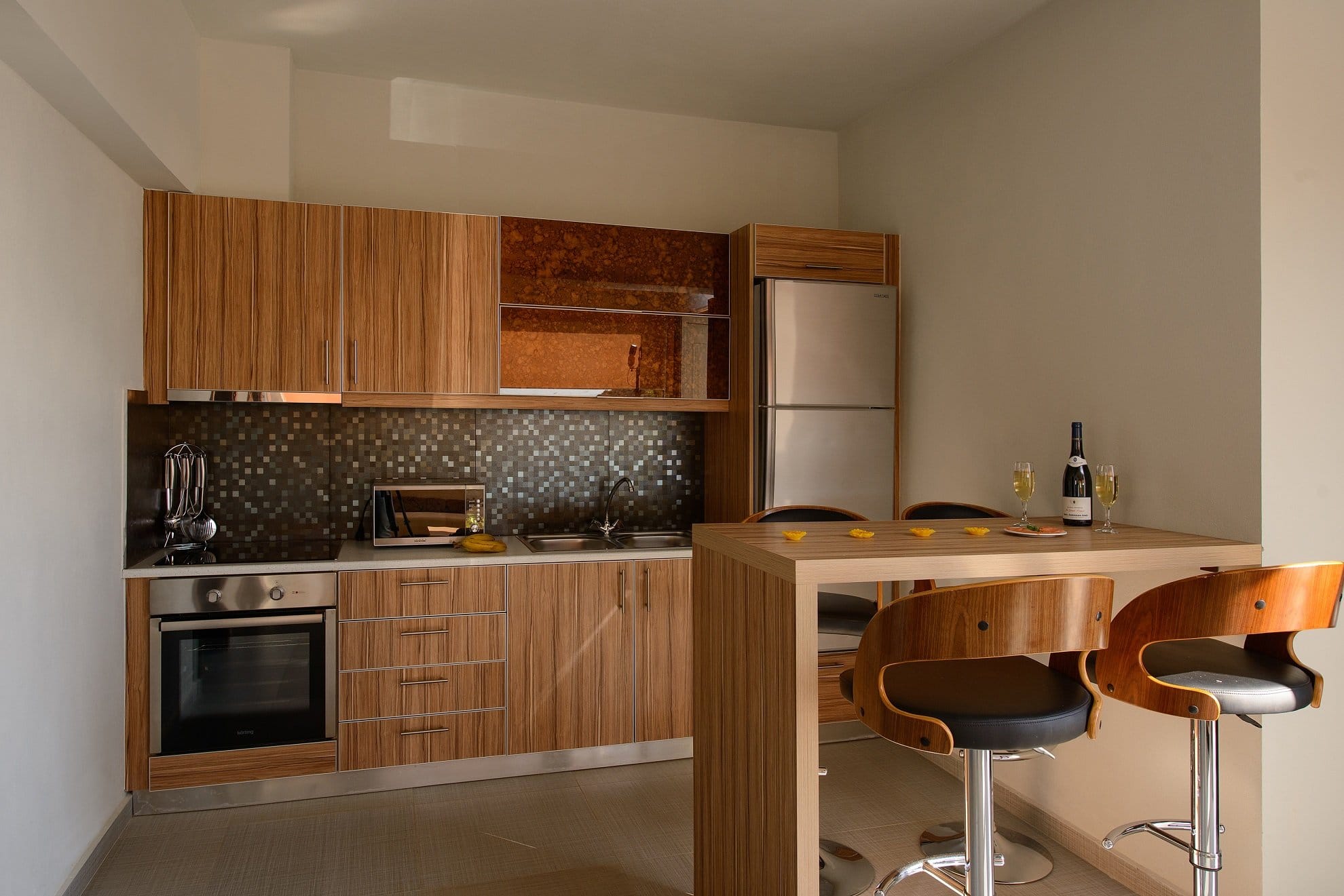a kitchen with wooden cabinets