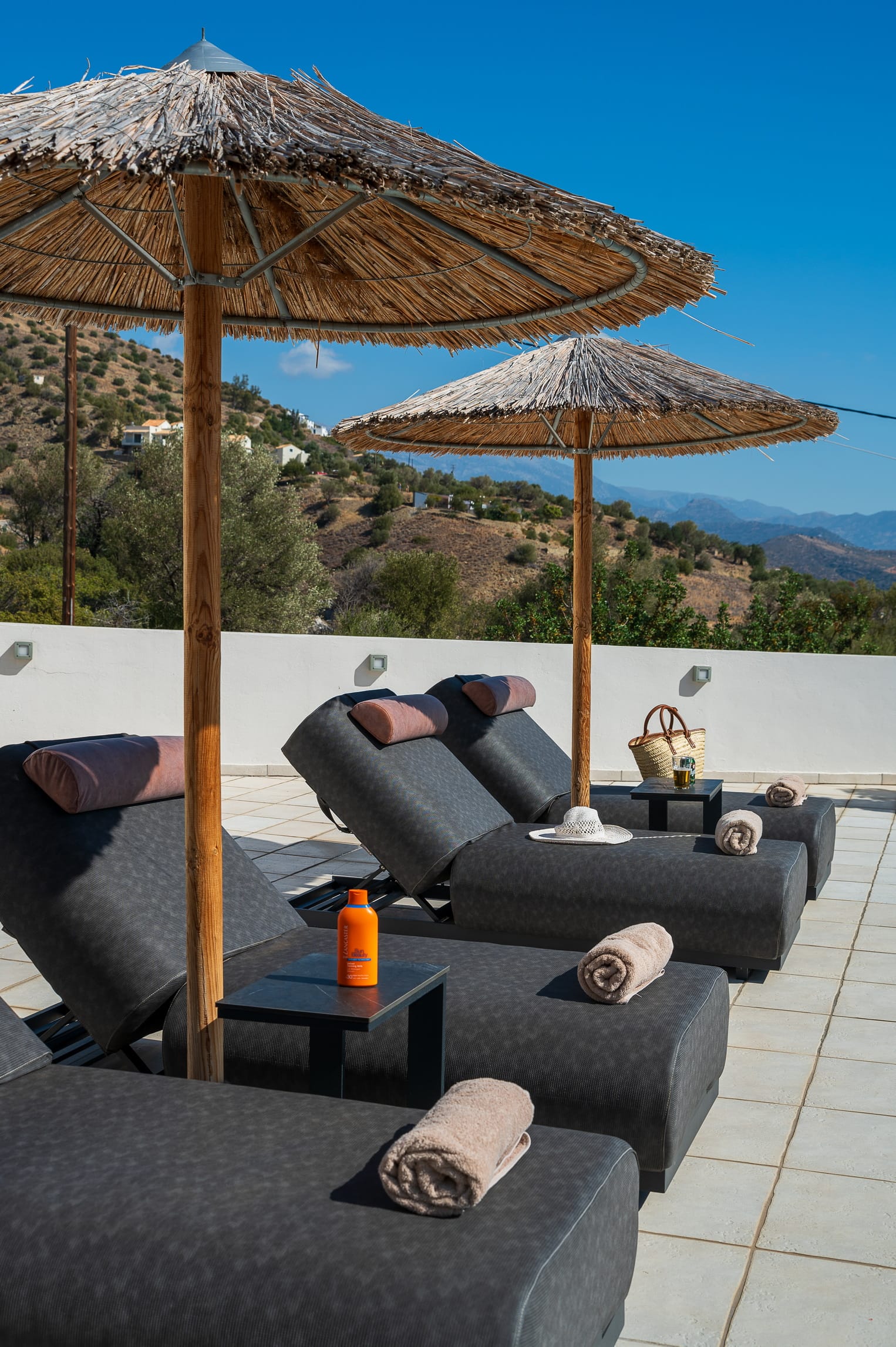 a couch and umbrella on a patio