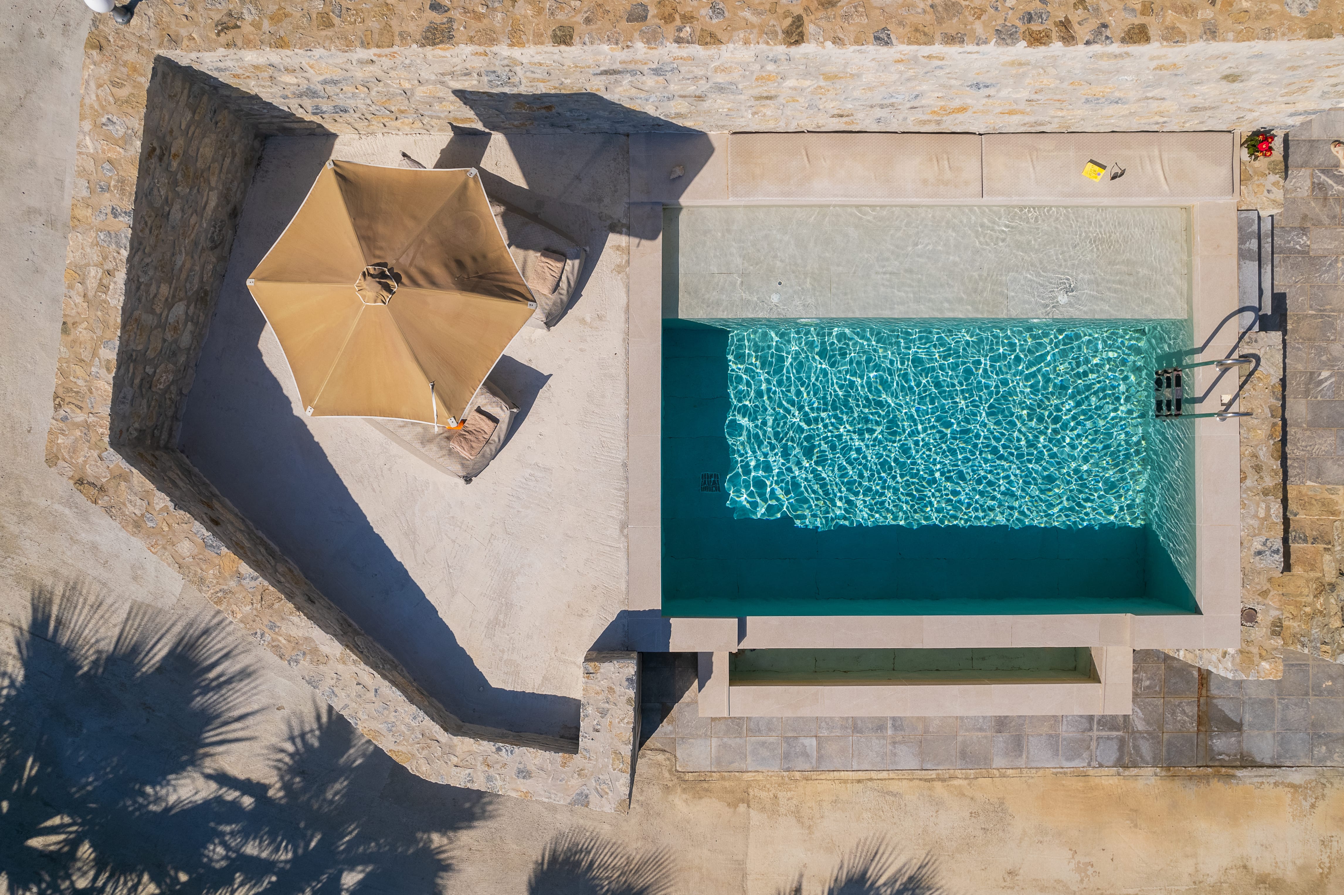 a couple of buildings with a pool