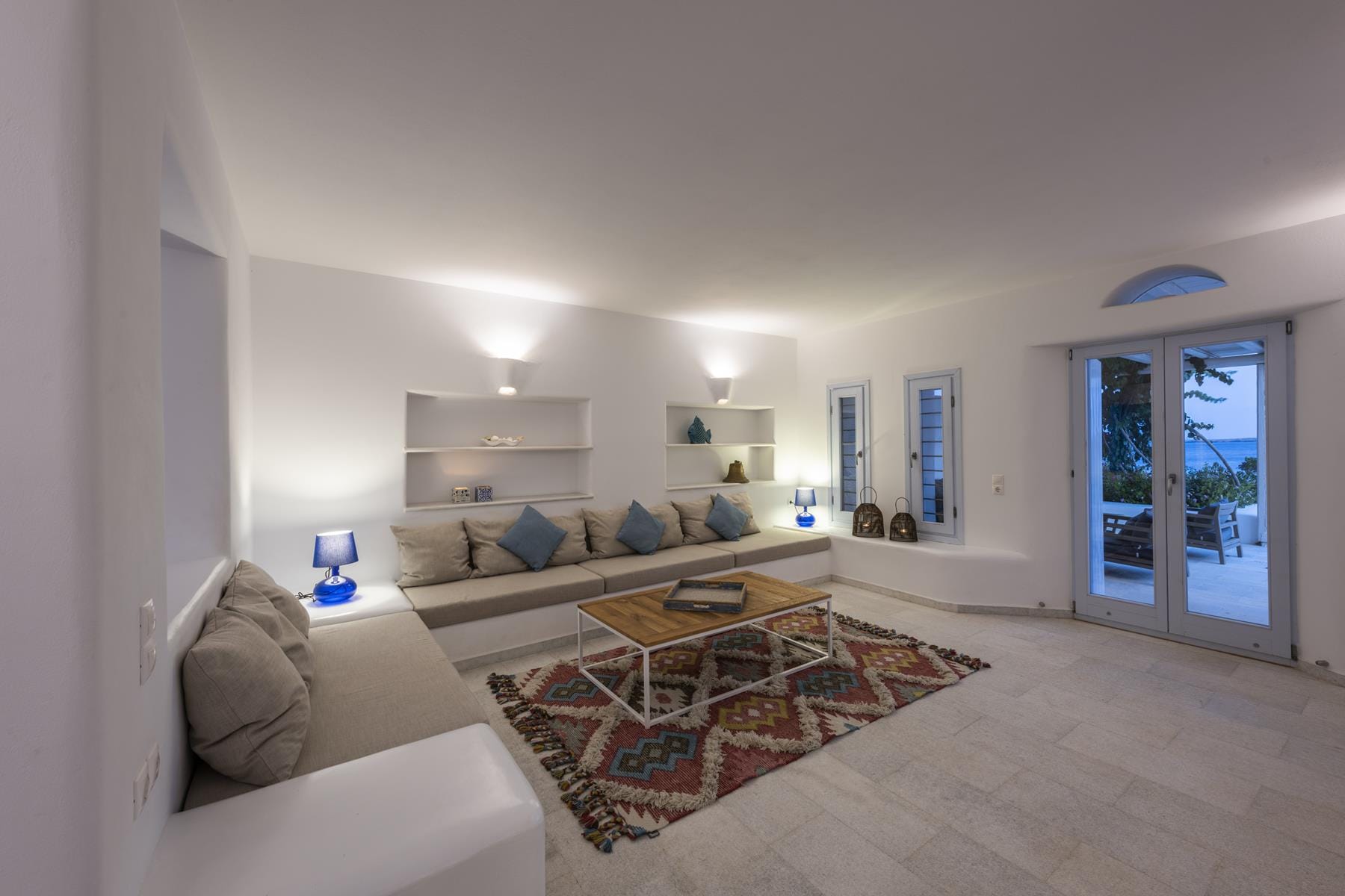 a living room with a couch and a table