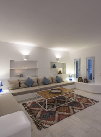 a living room with a couch and a table