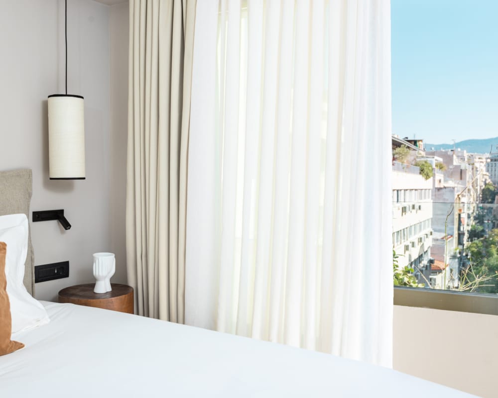 a bedroom with a window