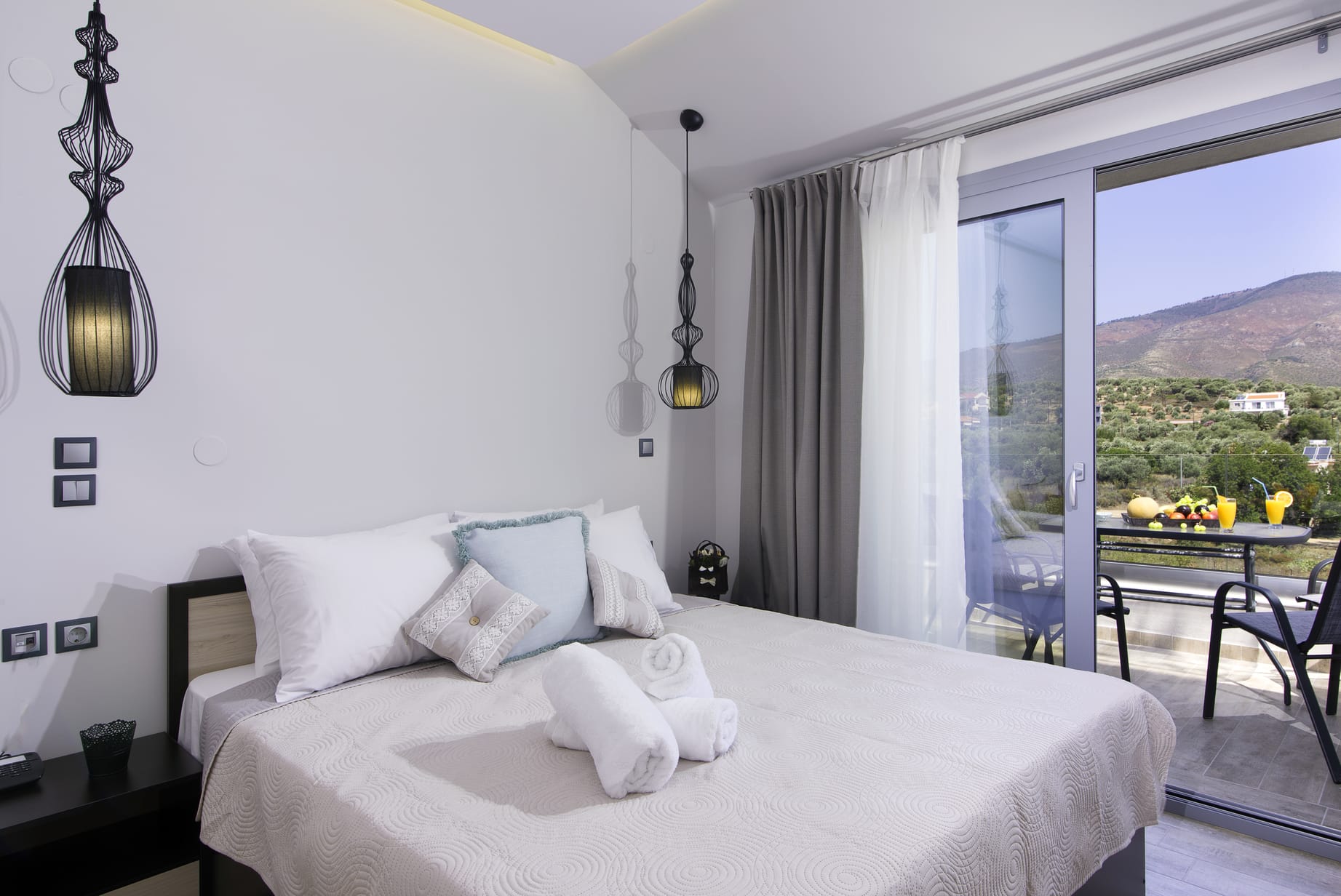 a bed with white sheets