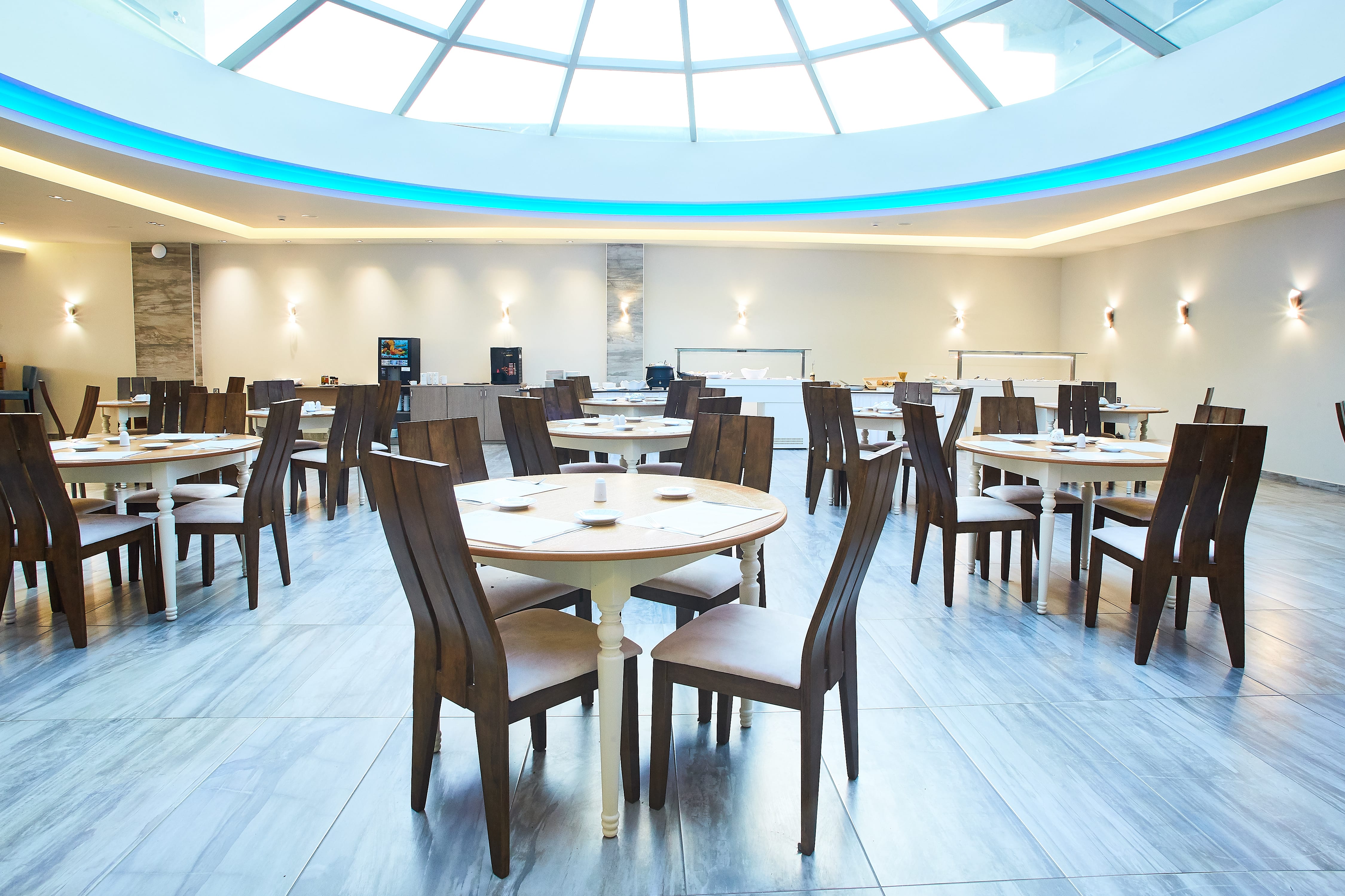 a room with tables and chairs