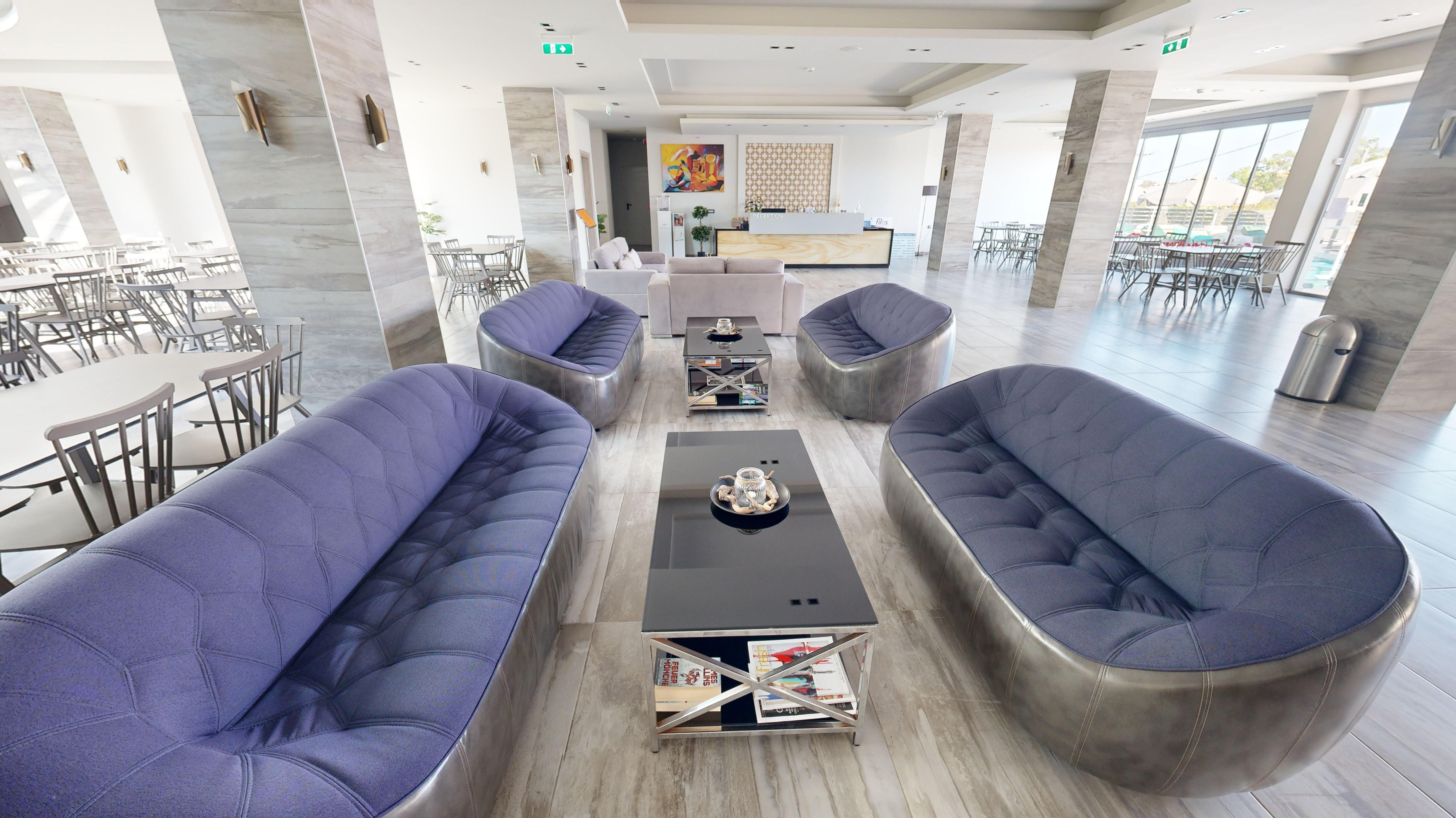 a room with couches and a table