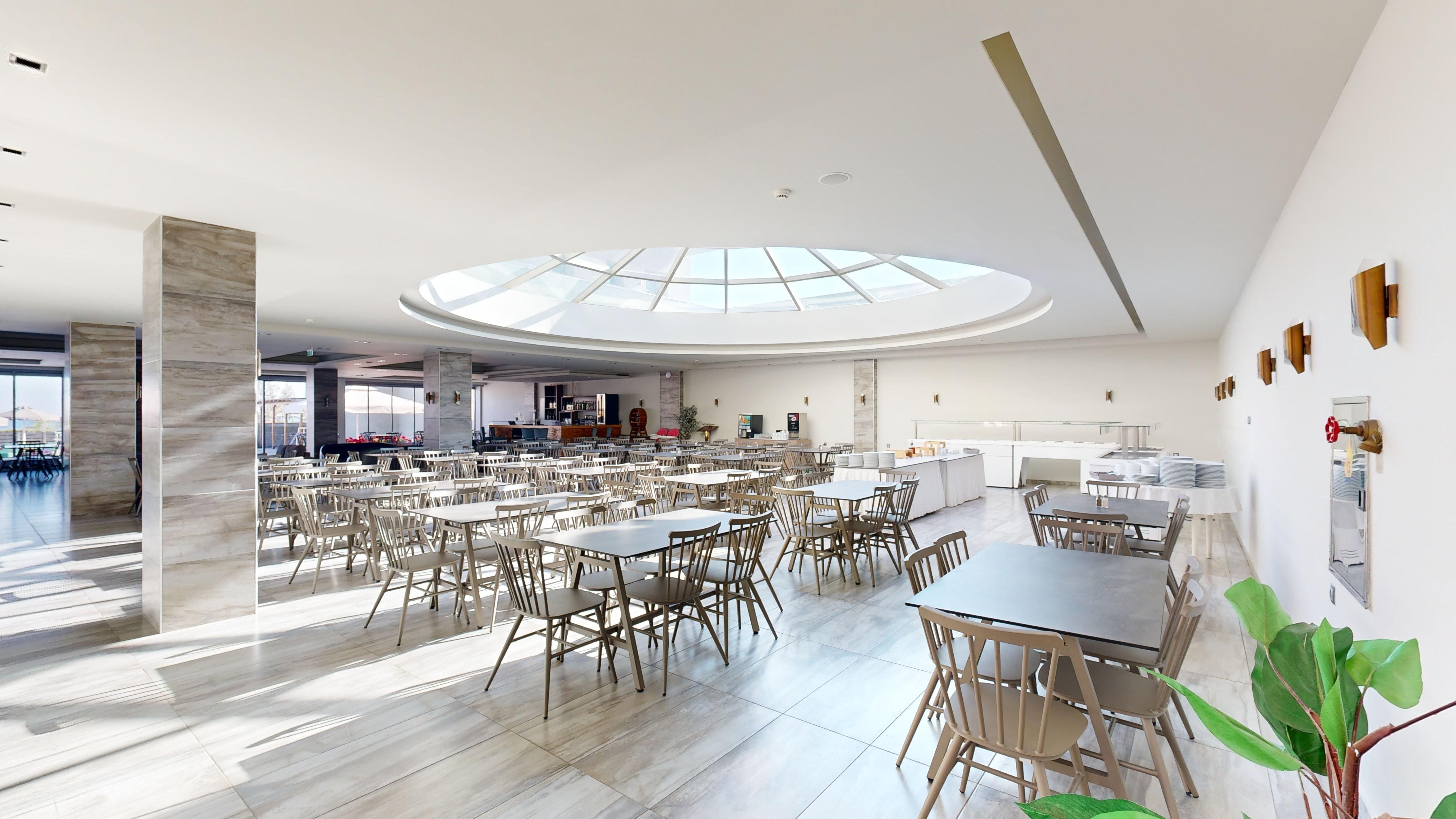 a room with tables and chairs