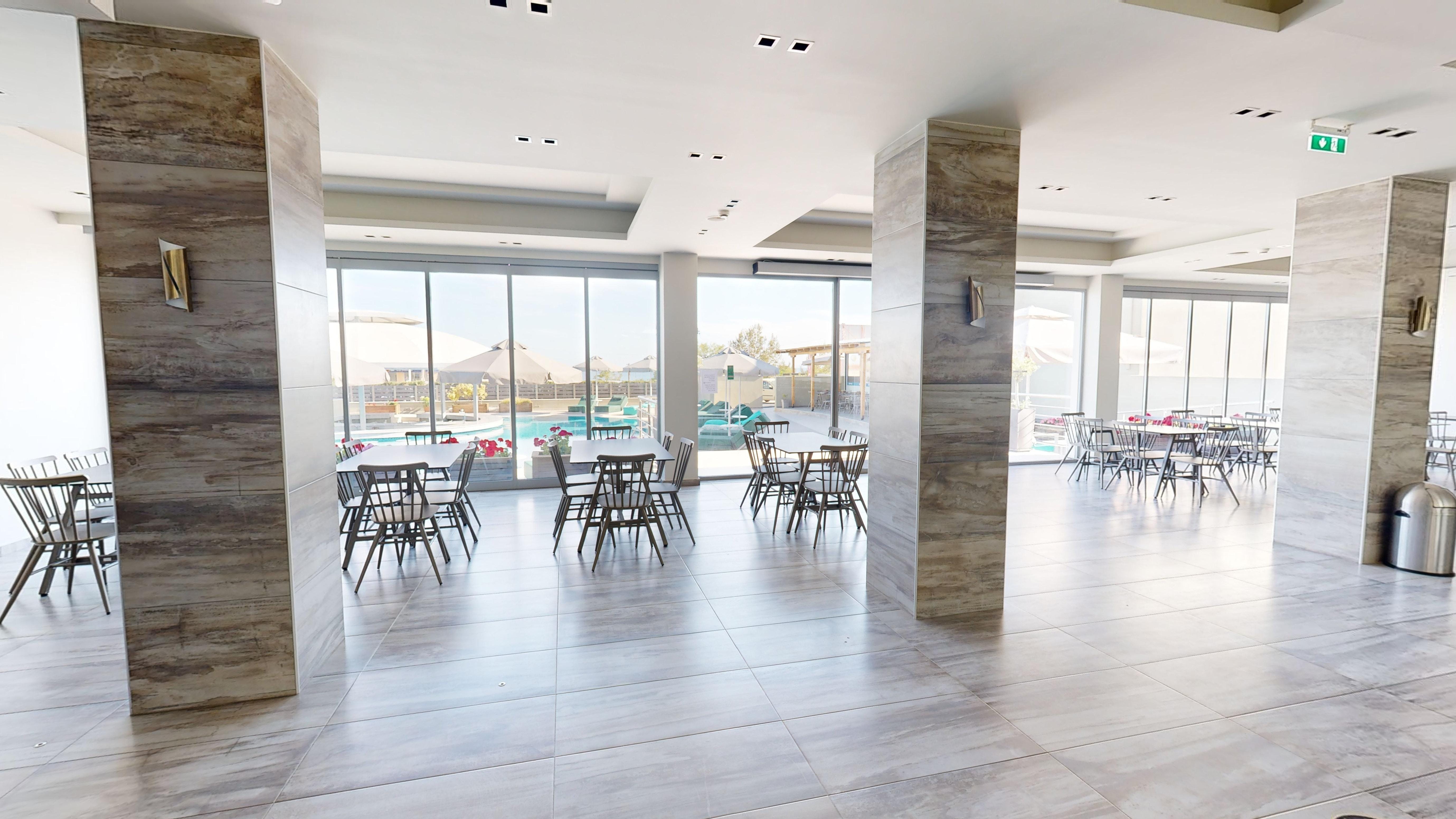 a room with tables and chairs