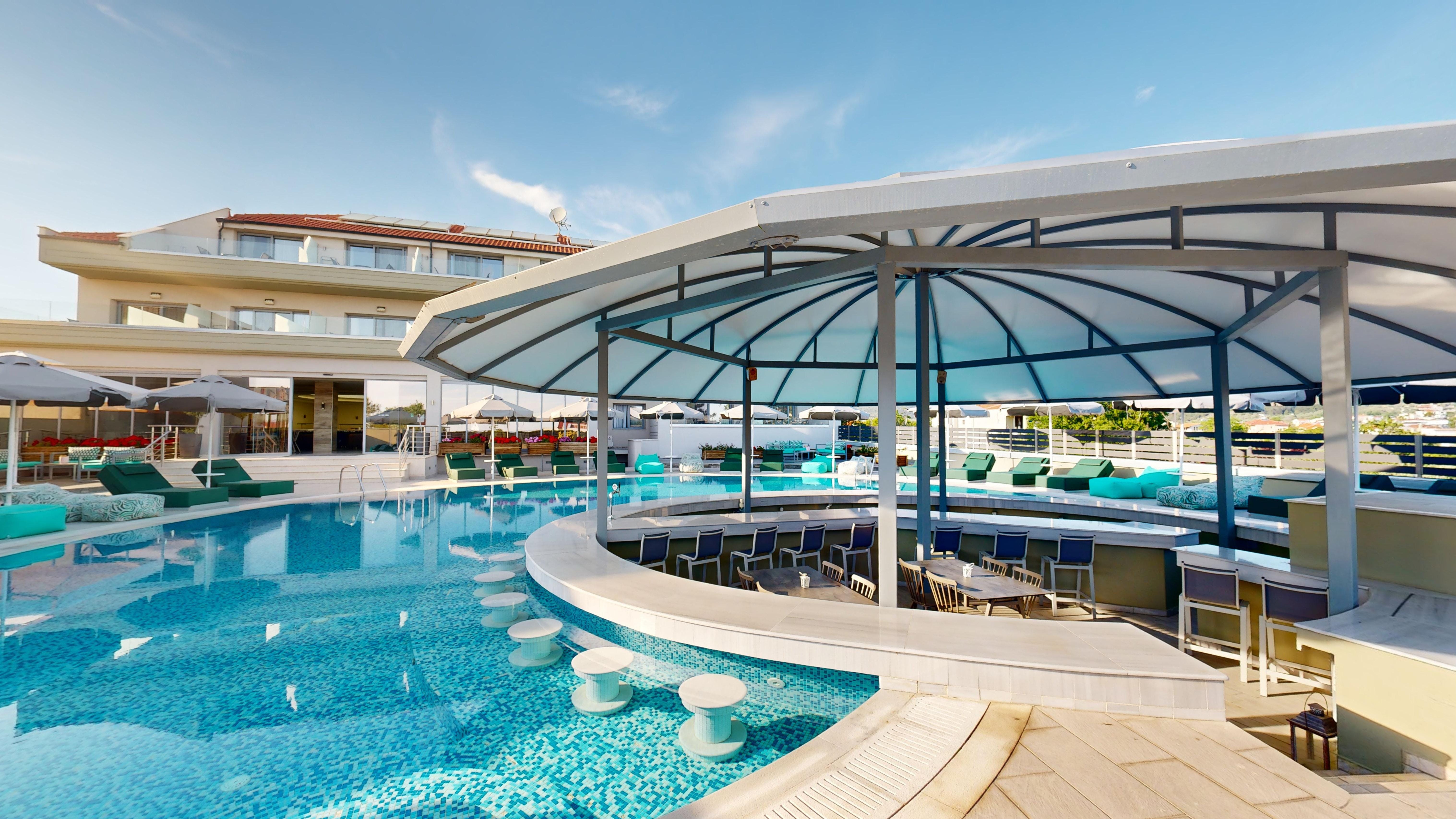 a swimming pool with a covered area