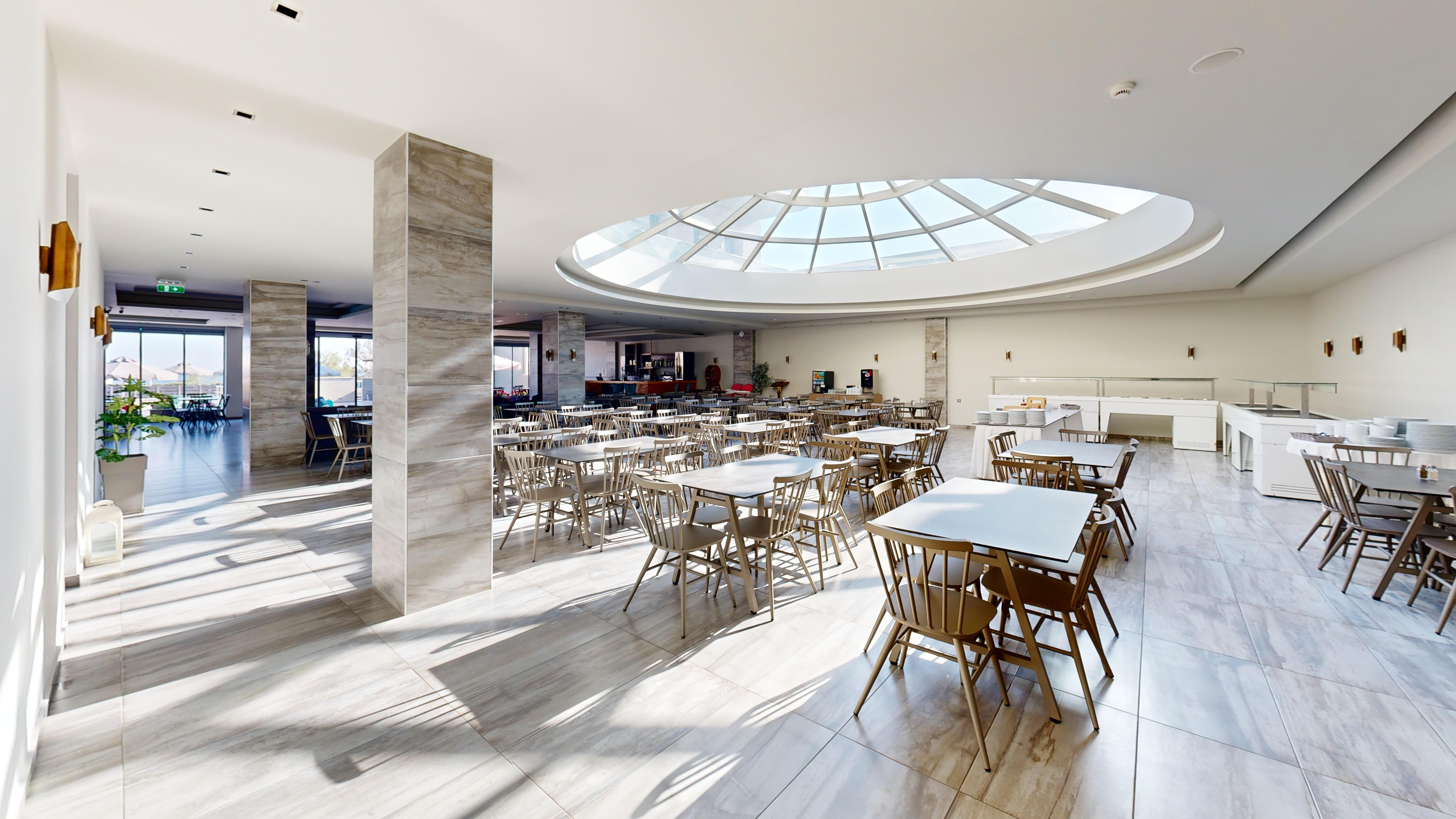 a room with tables and chairs