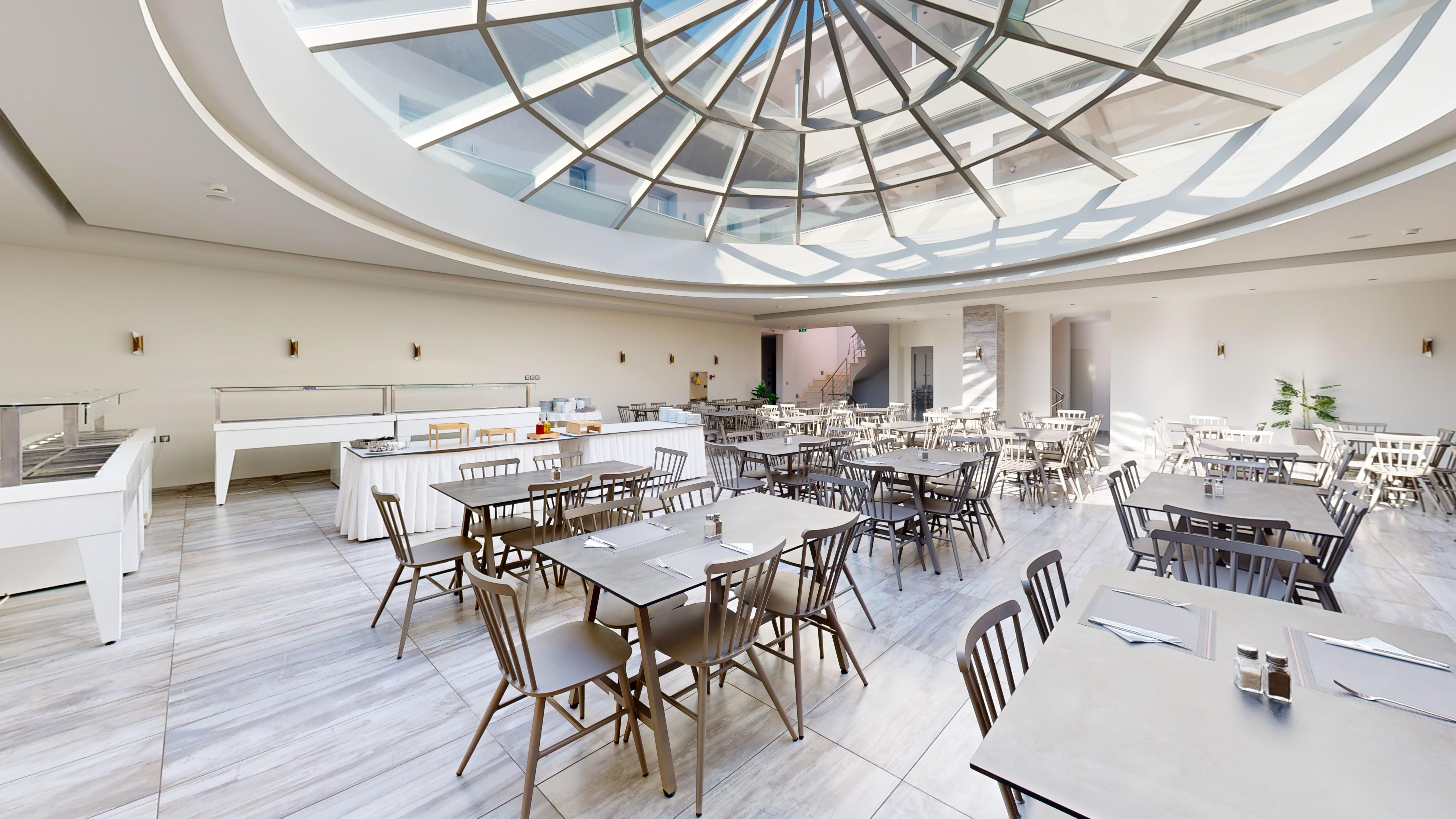 a room with tables and chairs