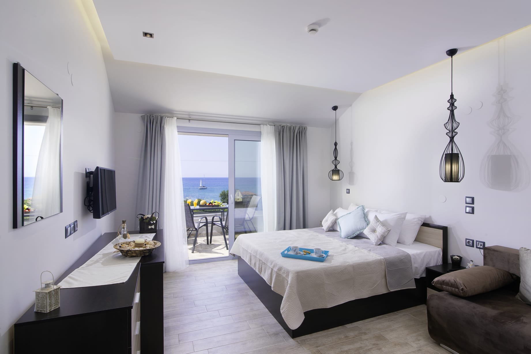 a bedroom with a large window