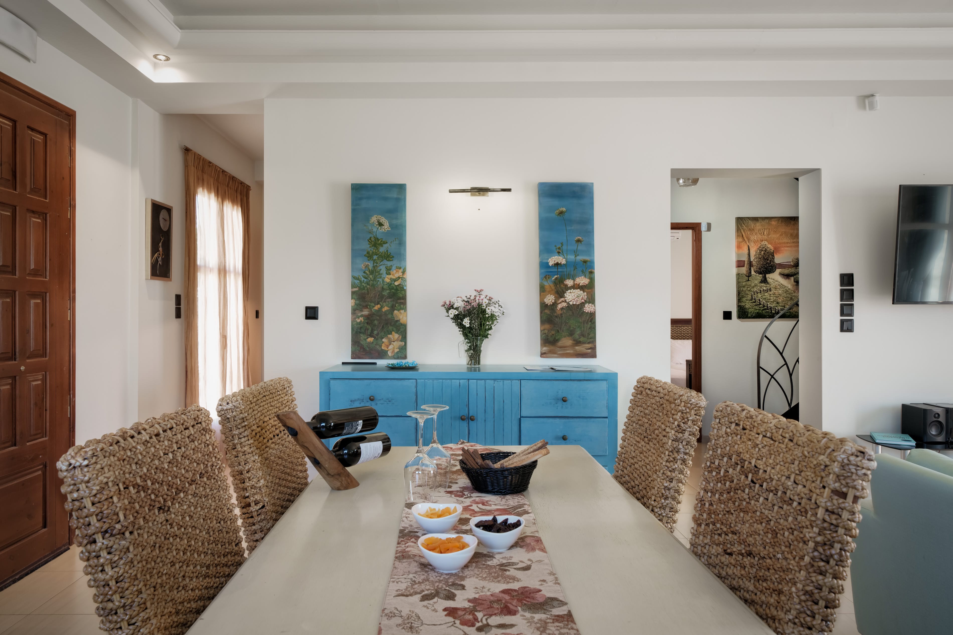 a living room with a couch and a table