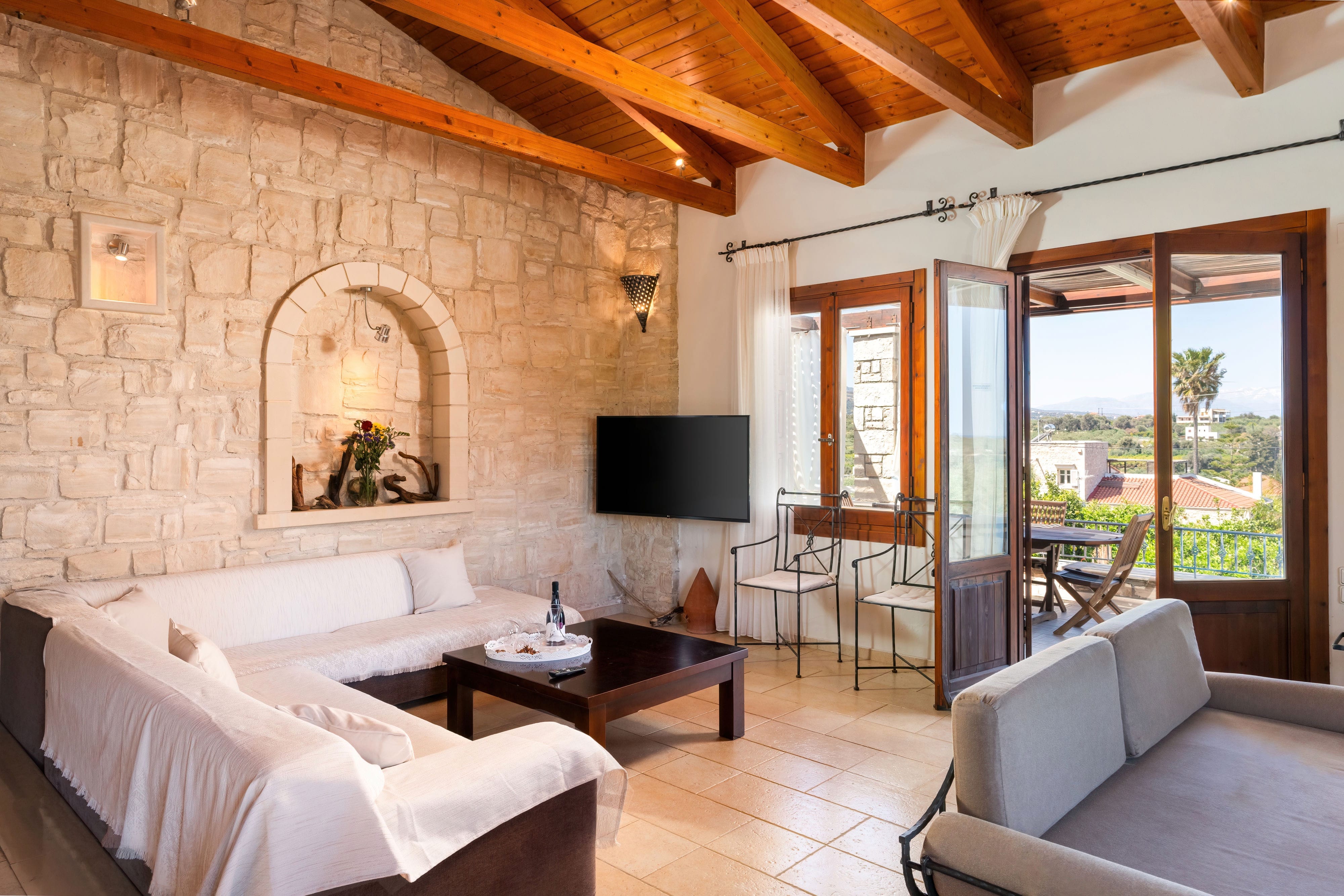 a room with a couch and a tv