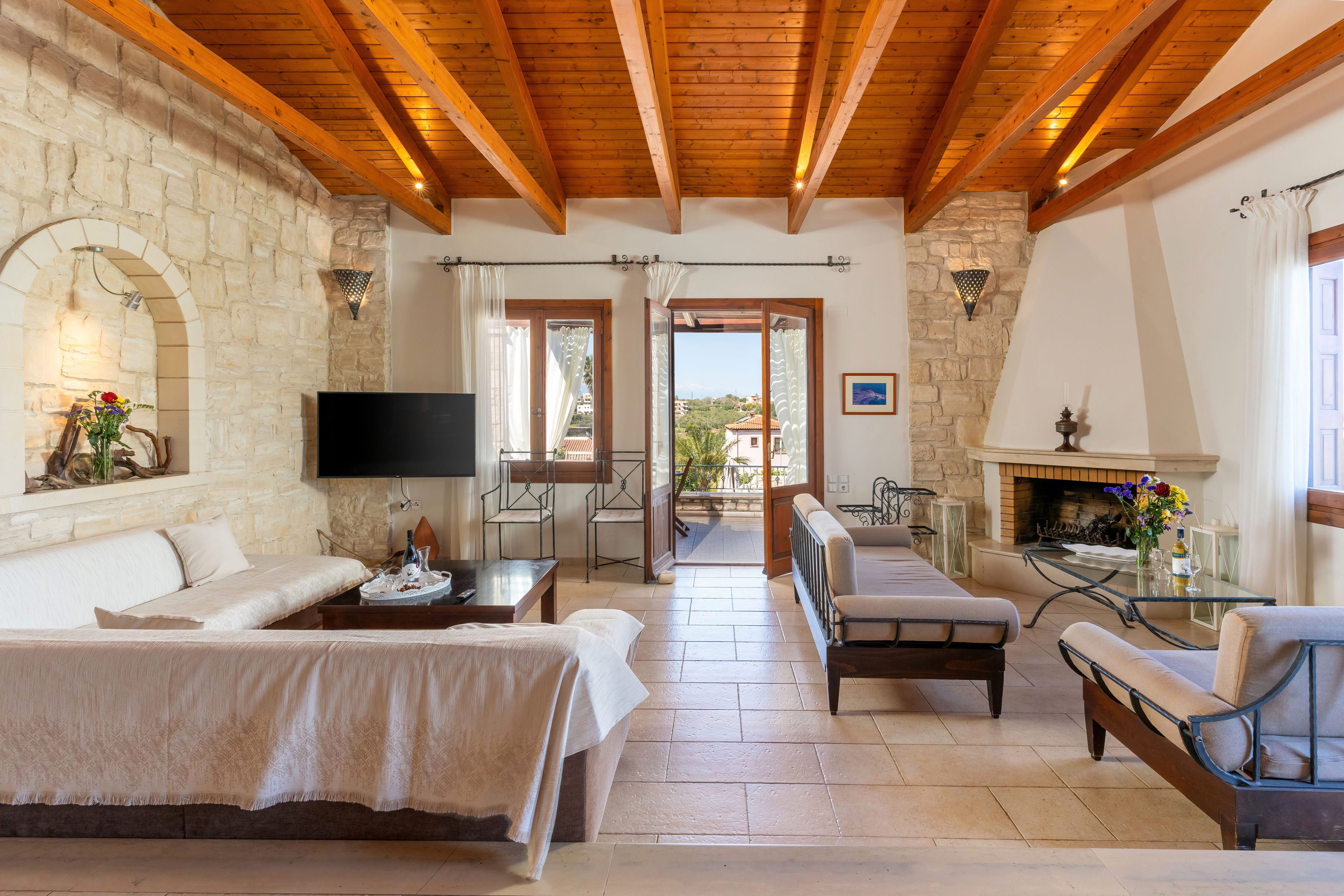 a large living room with a fireplace