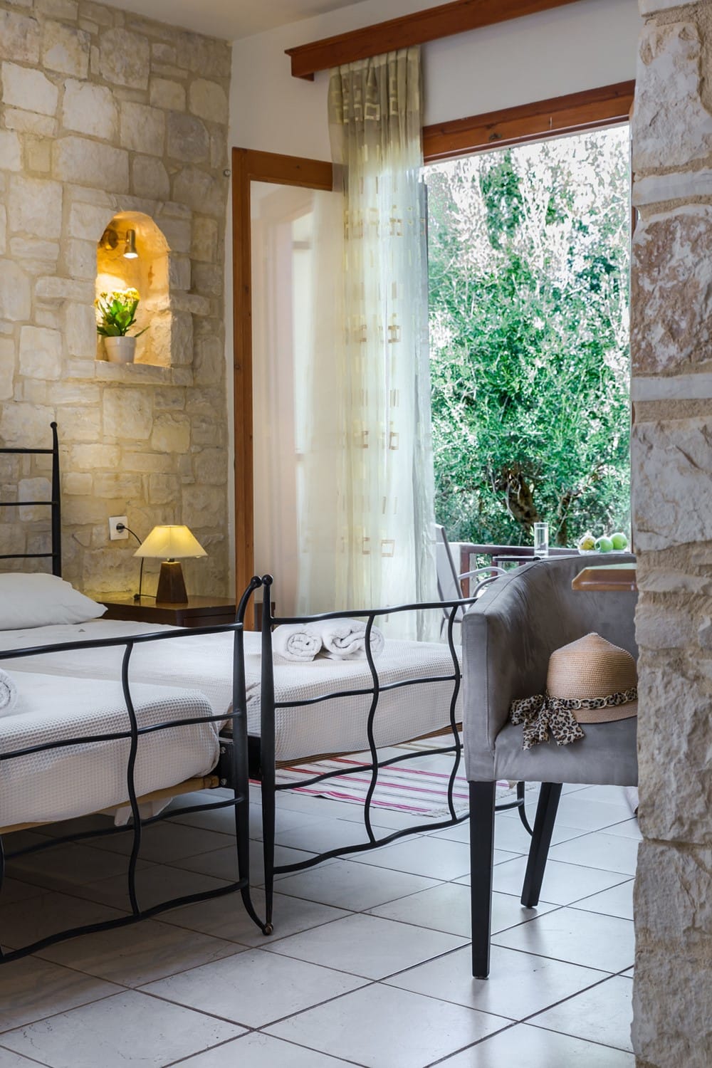 a room with a bed and a chair