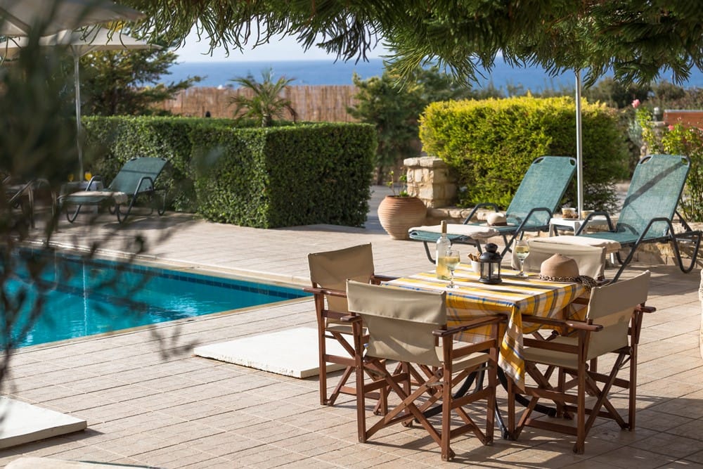 a table and chairs on a deck