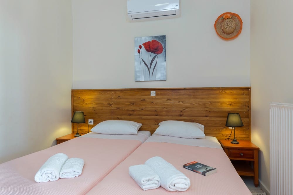 a bed with white towels on it