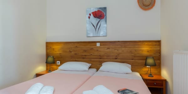 a bed with white towels on it