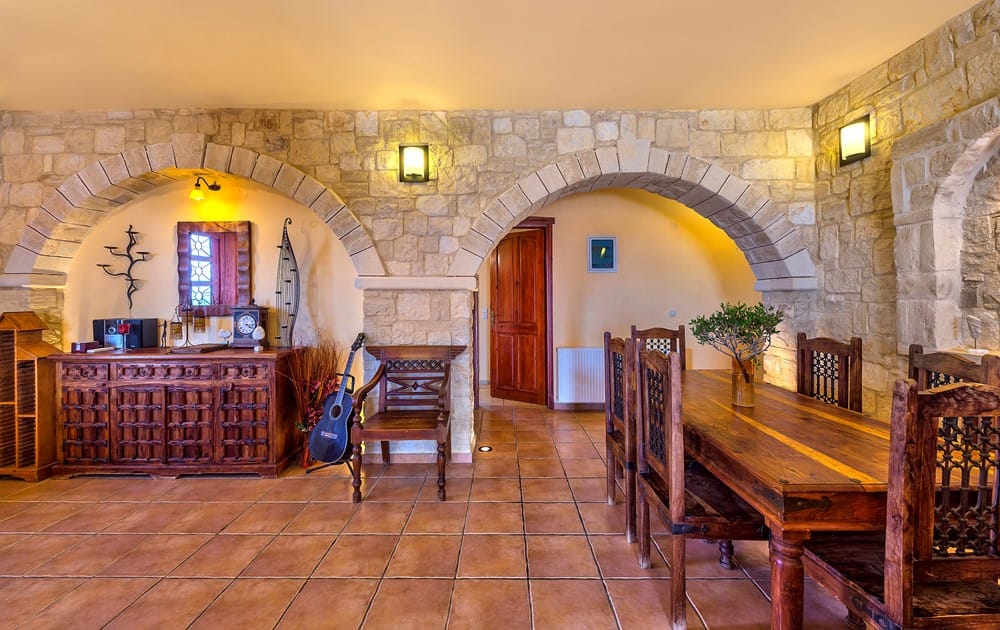 a large room with a few tables and chairs