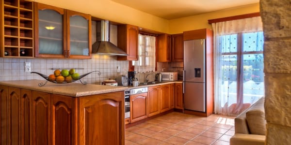 a kitchen with a tile floor