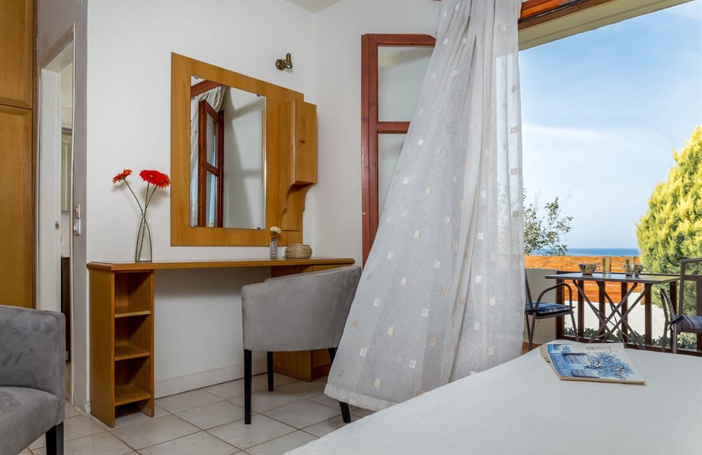 a room with a table and chairs