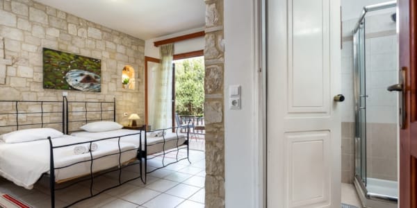 a room with a bed and a door