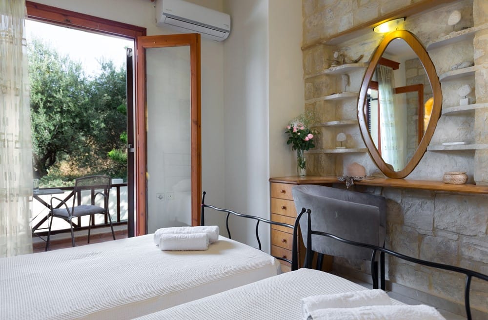 a bedroom with a large mirror