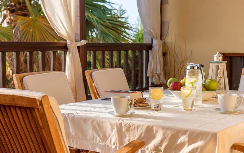 a table with a white tablecloth and a white tablecloth with a white tablecloth and a