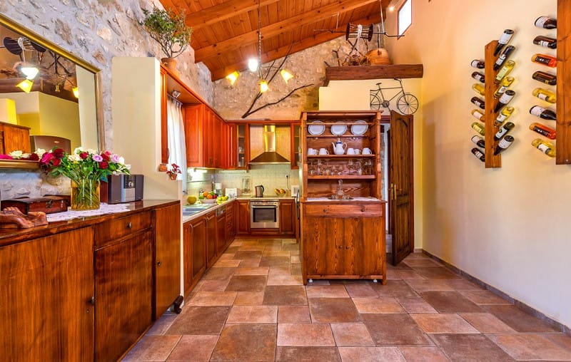 a kitchen with wooden cabinets